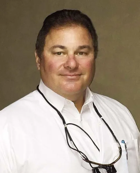 Dr. Charles Ditta